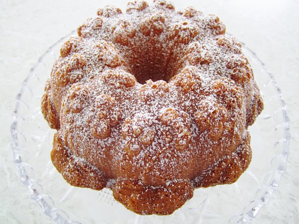 A bundt cake with powdered sugar on top of it.