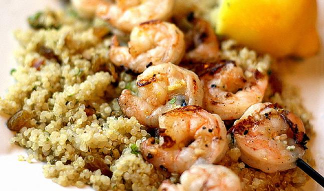 A close up of shrimp and couscous