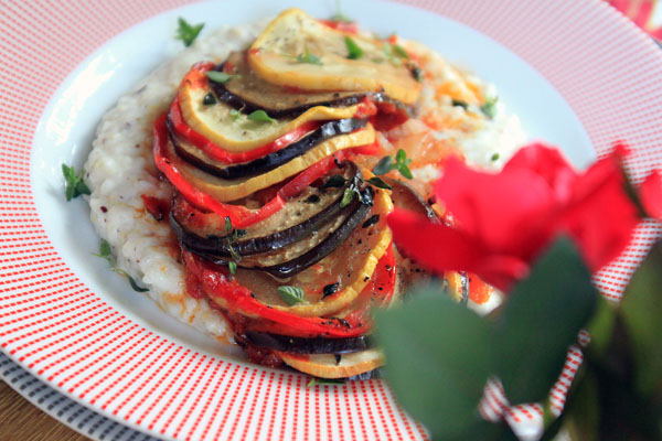 A plate of food with rice and vegetables on it.